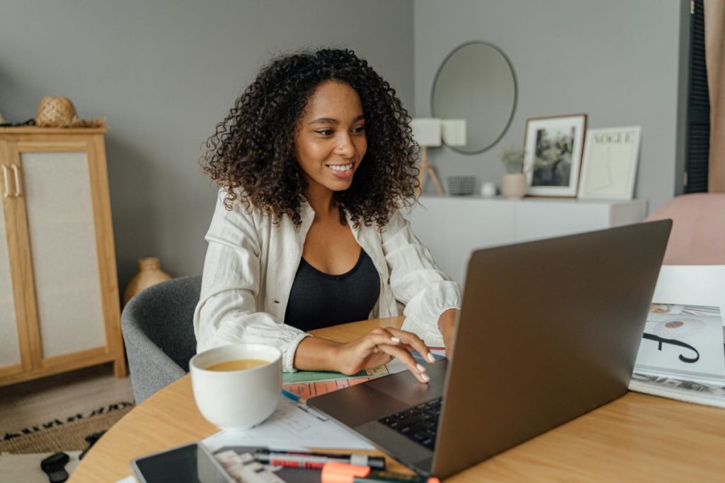 a woman working with laptop