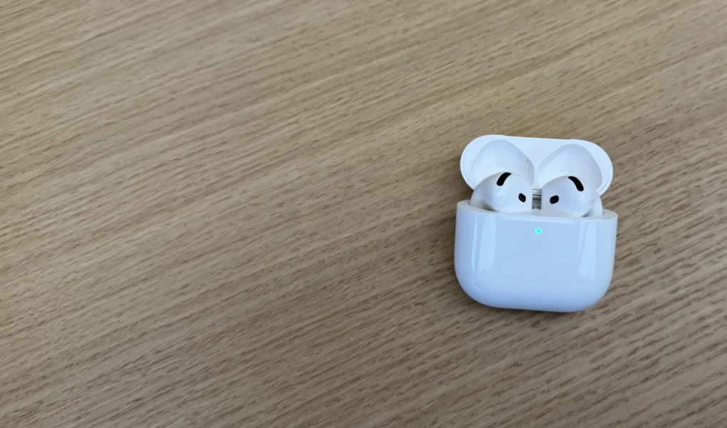 an airpod 4 on a desk