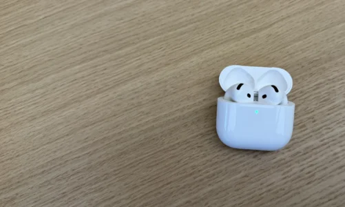 an airpod 4 on a desk