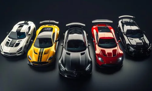 Lineup of five high-performance sports cars in different colors from top view.