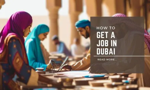 A group of people, including women in colorful headscarves, working at tables with documents, with text overlay reading "How to Get a Job in Dubai."